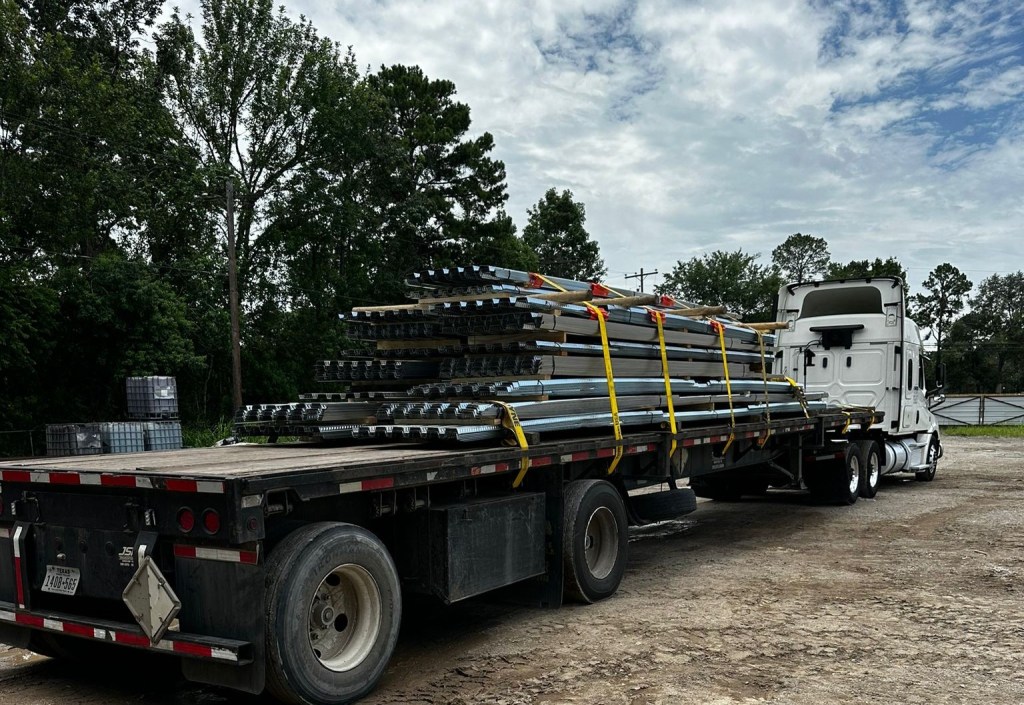 Non-composite steel deck loaded for delivery — Cutting Edge Decking Houston TX manufacturer